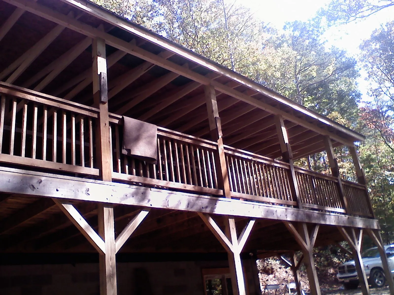 Timber framing under a new elevated porch and deck — Roof Leak Repair in Lopez Island by Roofing Brothers